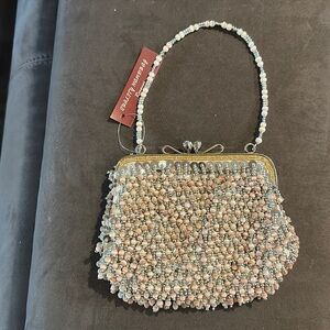 Beige beaded clutch with shoulder chain. New never used